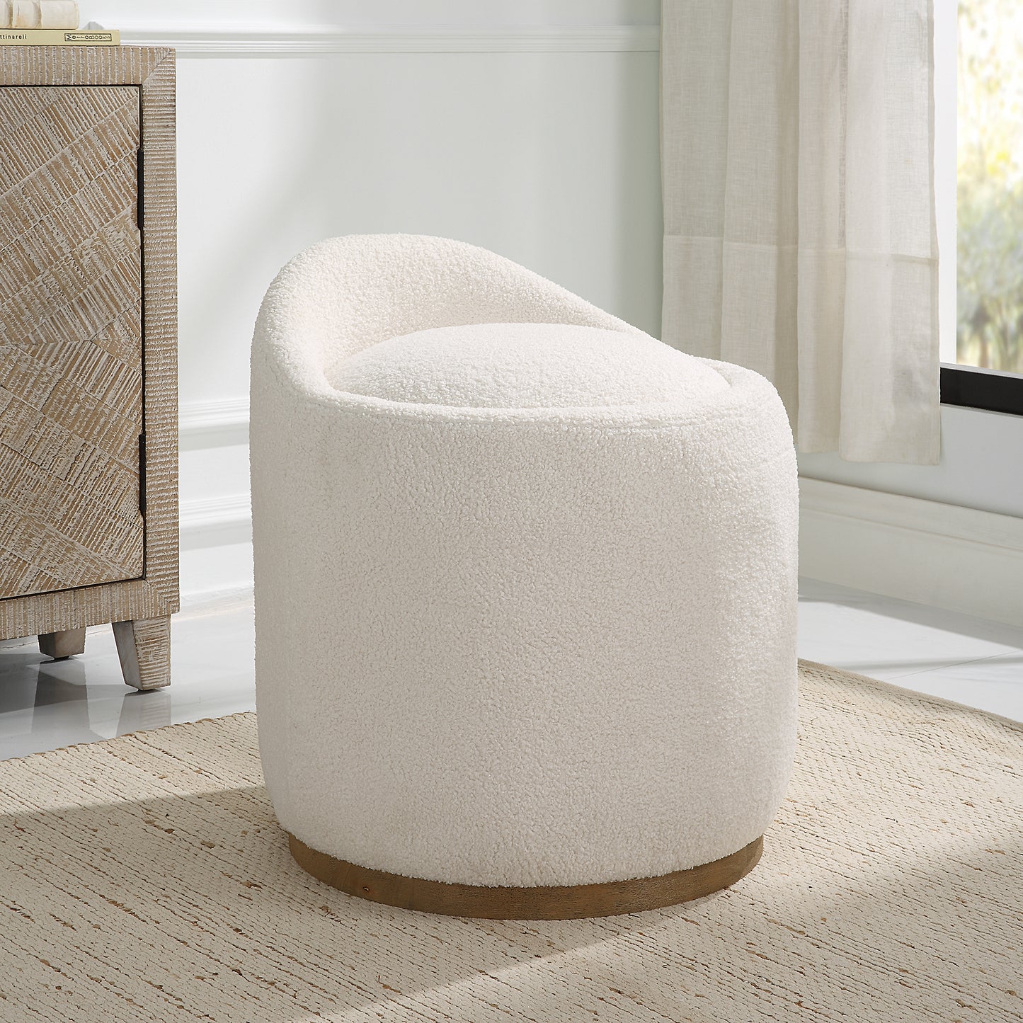 Uttermost Swirl Swivel Sheepskin Ottoman 23186