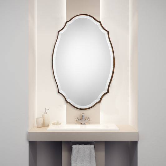 Lily Lifestyle Shaped Bevel Mirror Accented With A Rounded Edged Wood Frame, And Antiqued Bronze And Gold Finish